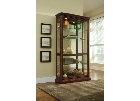 Pulaski Furniture Lighted Sliding Door 4 Shelf Curio Cabinet in Cherry Brown Room View