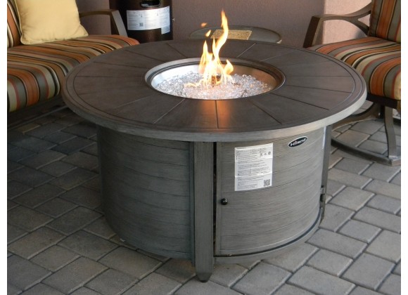 AZ Patio Heaters Cast Aluminum Round Fire Pit in Brushed Wood Finish - Lifestyle