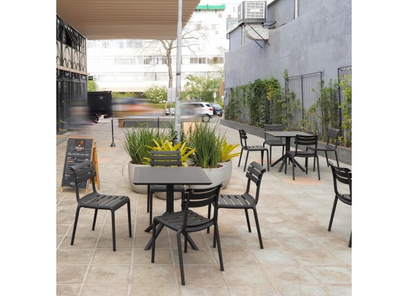 Compamia Helen Resin Outdoor Chair In Black - Lifestyle 3