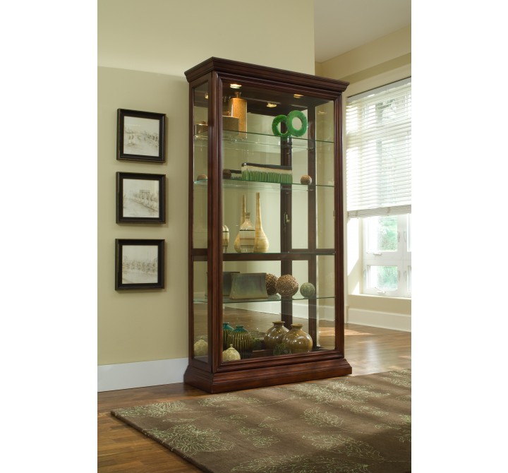 Pulaski Furniture Lighted Sliding Door 4 Shelf Curio Cabinet in Cherry Brown Room View