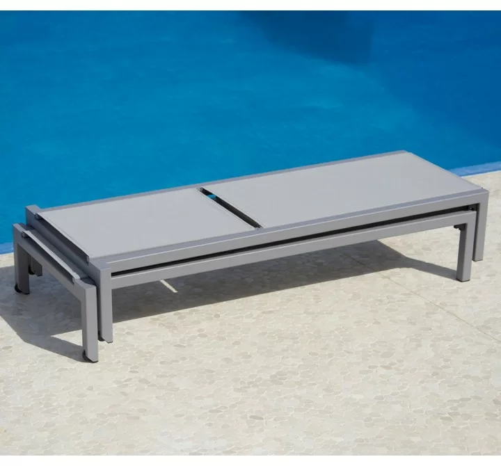 Cane-Line Relax Sunbed, Stackable pool view