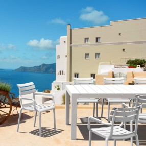 Compamia Paris Resin Outdoor Arm Chair In White - Lifestyle