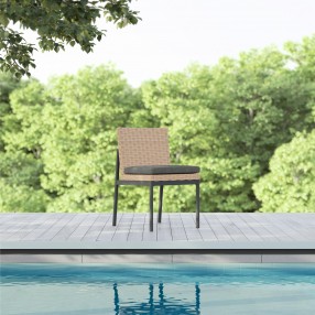 Azzurro Terra Armless Dining Chair With Matte Charcoal Aluminum Frame and Natural All-Weather Wicker - Lifestyle