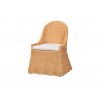 bali & pari Maya Natural Rattan Accent Chair - Hand Woven Wicker Dining Chair with Scalloped Skirt and Cushion, Coastal Boho Style Seating for Dining or Living Room, Light Honey - Angled