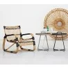 Cane-Line Curve Lounge Chair INDOOR - Black binding & table side view - Cane-Line Curve Lounge Chair INDOOR - Black binding & table side view