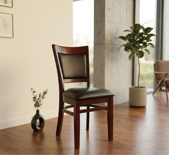 A close-up view of the Sloan dining chair showing its upholstered seat and back cushion, button or channel tufting detail, and tapered wood legs - ideal for showcasing fabric texture and stitching.